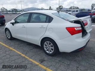 2012 Kia Rio LX with VIN KNADM4A31C6089842, listed as a IAAI auction lot 41928559 with 129,030 mi miles. Bid and sale history available at carsss.com. Image 3.