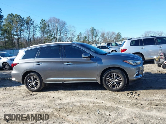 2016 Infiniti QX60 with VIN 5N1AL0MM0GC524715, listed as a IAAI auction lot 41215072 with 145,633 mi miles and . Bid and sale history available at DreamBid. Image 13.
