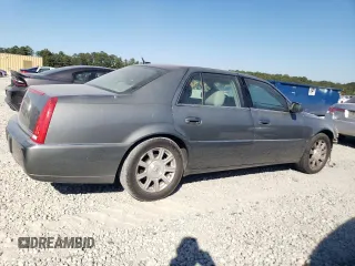 2008 Cadillac DTS 1SD z VIN 1G6KD57Y68U140938, wystawiony jako Copart lot #77525974 z przebiegiem 148 132 mil mil oraz Szkoda całkowita • Salvage title. Historia ofert i sprzedaży dostępna na DreamBid. Obrazek 3.