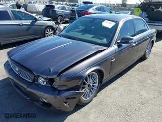 2008 Jaguar XJ with VIN SAJWA71B68SH22853, listed as a IAAI auction lot 41678688 with 76,367 mi miles. Bid and sale history available at carsss.com. Image 19.