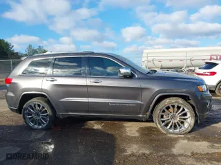 2014 Jeep Grand Cherokee Overland with VIN 1C4RJFCT8EC183165, listed as a IAAI auction lot 41298114 with 114,187 mi miles. Bid and sale history available at carsss.com. Image 13.