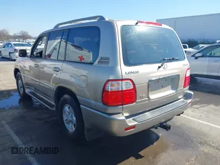2000 Lexus LX 470 with VIN JT6HT00W8Y0118377, listed as a IAAI auction lot 41787649 with 230,442 mi miles and . Bid and sale history available at carsss.com. Image 3.