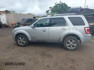 2008 Ford Escape Limited z VIN 1FMCU04158KB42604, wystawiony jako IAAI lot #41948050 z przebiegiem 240 686 mil mil oraz . Historia ofert i sprzedaży dostępna na DreamBid. Obrazek 14.