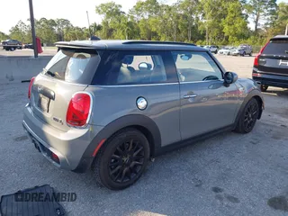 2020 MINI Hardtop Cooper S z VIN WMWXR5C00L2M23924, wystawiony jako IAAI lot #41520706 z przebiegiem 123 006 mil mil oraz . Historia ofert i sprzedaży dostępna na DreamBid. Obrazek 4.