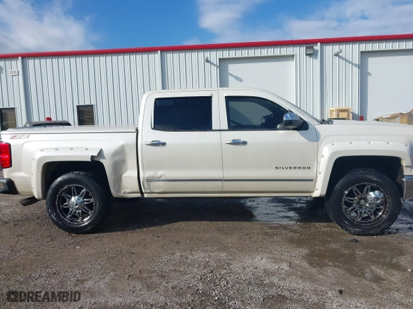 2014 Chevrolet Silverado 1500 LTZ with VIN 3GCUKSEC5EG165684, listed as a IAAI auction lot 41114072 with 133,423 mi miles. Bid and sale history available at carsss.com. Image 13.