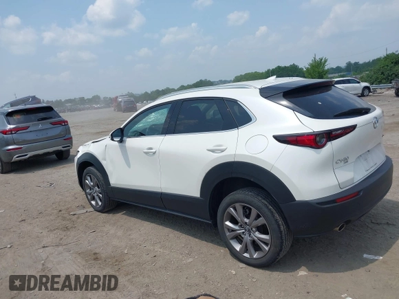 2021 Mazda CX-30 Premium with VIN 3MVDMBDL0MM307045, listed as a IAAI auction lot 42446494 with 33,112 mi miles and . Bid and sale history available at DreamBid. Image 3.