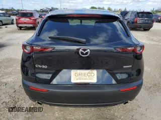 2021 Mazda CX-30 Select z VIN 3MVDMABL5MM211196, wystawiony jako Copart lot #73291012 z przebiegiem 15 871 mil mil oraz Nie do naprawy • Non repairable. Historia ofert i sprzedaży dostępna na DreamBid. Obrazek 6.