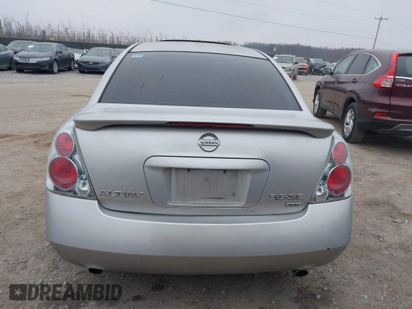 2005 Nissan Altima SE with VIN 1N4BL11E65C133566, listed as a IAAI auction lot 41792300 with 169,733 mi miles. Bid and sale history available at carsss.com. Image 16.