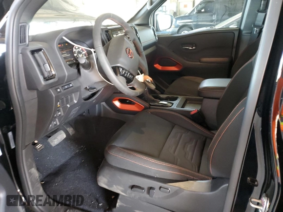 2025 Nissan Frontier S with VIN 1N6ED1EK6SN623961, listed as a Copart auction lot 57083555 with 4,720 mi miles and Salvage title. Bid and sale history available at DreamBid. Image 7.