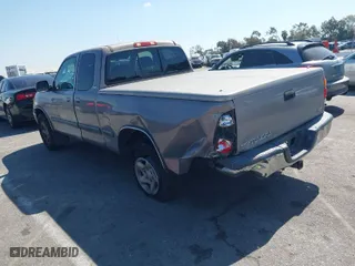 2000 Toyota Tundra SR5 with VIN 5TBRT3415YS083140, listed as a IAAI auction lot 41750409 with 273,717 mi miles. Bid and sale history available at carsss.com. Image 3.