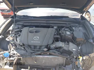 2022 Mazda CX-30 S Carbon Edition with VIN 3MVDMBCL3NM440188, listed as a IAAI auction lot 42259723 with 48,555 mi miles and . Bid and sale history available at DreamBid. Image 10.