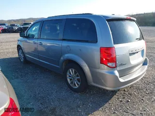 2014 Dodge Grand Caravan SXT 30th Anniversary with VIN 2C4RDGCG3ER253517, listed as a IAAI auction lot 41853737 with 194,476 mi miles. Bid and sale history available at carsss.com. Image 3.