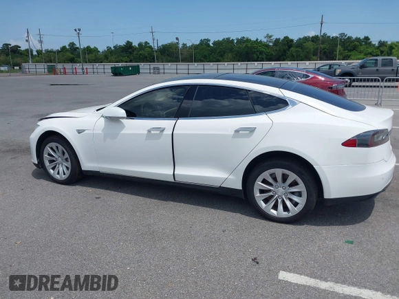 2014 Tesla Model S 60 with VIN 5YJSA1H12EFP39582, listed as a IAAI auction lot 42545143 with 117,383 mi miles and . Bid and sale history available at DreamBid. Image 14.