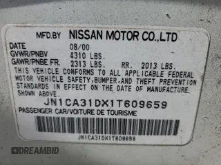 2001 Nissan Maxima GXE z VIN JN1CA31DX1T609659, wystawiony jako Copart lot #68002774 z przebiegiem 145 241 mil mil oraz Szkoda całkowita • Salvage title. Historia ofert i sprzedaży dostępna na DreamBid. Obrazek 13.