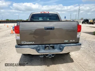 2010 Toyota Tundra with VIN 5TFDW5F12AX123529, listed as a Copart auction lot 60132615 with 264,205 mi miles and Clean title. Bid and sale history available at DreamBid. Image 6.