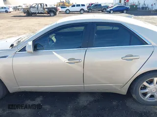 2009 Cadillac CTS AWD z VIN 1G6DT57V990107958, wystawiony jako IAAI lot #41685415 z przebiegiem 148 294 mil mil oraz . Historia ofert i sprzedaży dostępna na DreamBid. Obrazek 15.
