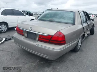 2004 Mercury Grand Marquis LS Premium with VIN 2MEFM75W44X604564, listed as a IAAI auction lot 41740462 with 119,693 mi miles. Bid and sale history available at carsss.com. Image 4.