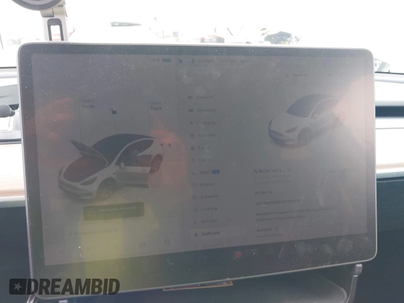 2023 Tesla Model Y Long Range with VIN 7SAYGAEE9PF702910, listed as a IAAI auction lot 42199519 with 91,094 mi miles and . Bid and sale history available at DreamBid. Image 18.