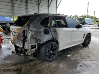 2015 BMW X5 M with VIN 5YMKT6C55F0C89468, listed as a Copart auction lot 75391074 with 0 mi miles and Salvage Title. Bid and sale history available at carsss.com. Image 3.