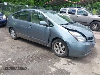 2005 Toyota Prius z VIN JTDKB20U853125464, wystawiony jako IAAI lot #42324259 z przebiegiem 166 742 mil mil oraz . Historia ofert i sprzedaży dostępna na DreamBid. Obrazek 1.