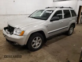 2009 Jeep Grand Cherokee Laredo with VIN 1J8HR48P69C556058, listed as a Copart auction lot 84746984 with 190,045 mi miles and Salvage Title. Bid and sale history available at carsss.com. Image 1.
