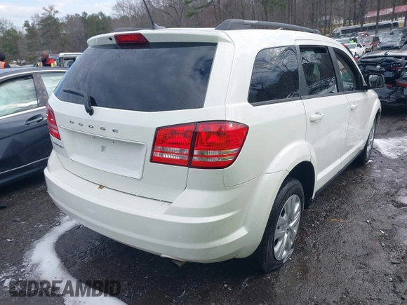 2018 Dodge Journey SE with VIN 3C4PDCAB1JT295988, listed as a IAAI auction lot 41226385 with 106,639 mi miles. Bid and sale history available at carsss.com. Image 4.