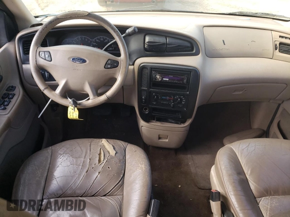 2002 Ford Windstar SE with VIN 2FMZA52462BA09199, listed as a Copart auction lot 83097064 with 216,158 mi miles and Salvage title. Bid and sale history available at DreamBid. Image 8.