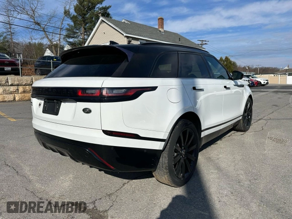 2019 Land Rover Range Rover Velar R-Dynamic SE с VIN SALYL2EXXKA227147, выставлен на аукционе Copart как лот 50736005 с пробегом 127 382 миль миль и Чистый • Clean title. История ставок и продаж доступна на DreamBid. Изображение 3.