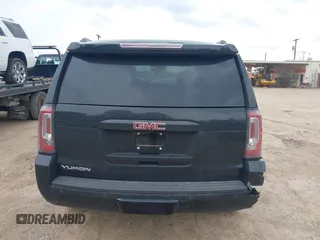 2015 GMC Yukon SLT with VIN 1GKS1BKC5FR274408, listed as a IAAI auction lot 41942157 with 165,978 mi miles. Bid and sale history available at carsss.com. Image 16.