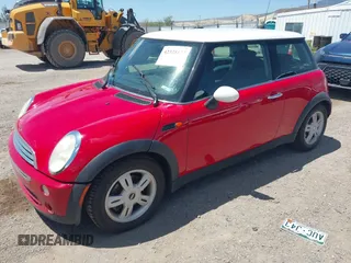 2006 MINI Hardtop with VIN WMWRC33556TK72619, listed as a IAAI auction lot 42328177 with 106,398 mi miles and . Bid and sale history available at DreamBid. Image 2.