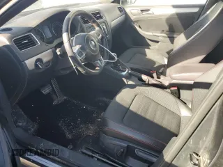 2014 Volkswagen Jetta GLI z VIN 3VW4T7AJ6EM398115, wystawiony jako Copart lot #89179925 z przebiegiem 81 264 mil mil oraz Szkoda całkowita • Salvage title. Historia ofert i sprzedaży dostępna na DreamBid. Obrazek 7.
