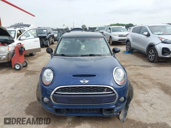 2017 MINI Hardtop 4 Door Cooper S z VIN WMWXU3C3XH2F49313, wystawiony jako IAAI lot #42137594 z przebiegiem 87 865 mil mil oraz . Historia ofert i sprzedaży dostępna na DreamBid. Obrazek 11.