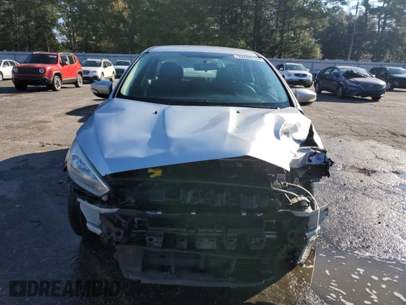 2017 Ford Focus SE with VIN 1FADP3F28HL315779, listed as a Copart auction lot 82608154 with 143,902 mi miles and Salvage title. Bid and sale history available at DreamBid. Image 5.