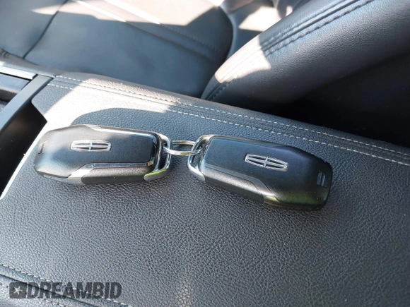 2014 Lincoln MKZ with VIN 3LN6L2G92ER826644, listed as a IAAI auction lot 42797602 with 153,069 mi miles and . Bid and sale history available at DreamBid. Image 11.