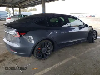 2021 Tesla Model 3 Performance with VIN 5YJ3E1EC1MF074350, listed as a Copart auction lot 47434275 with 63,319 mi miles and Salvage Title. Bid and sale history available at DreamBid. Image 3.