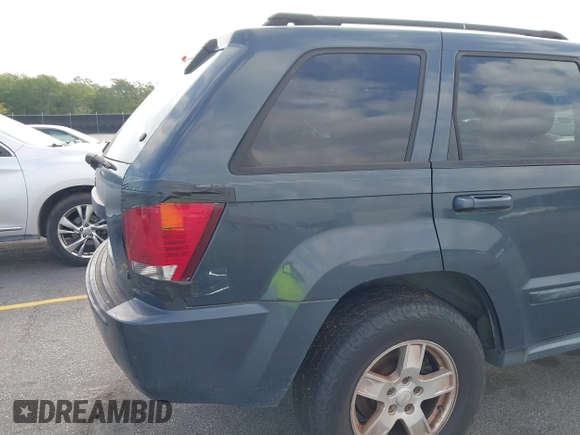2007 Jeep Grand Cherokee Laredo with VIN 1J8GS48K17C684497, listed as a IAAI auction lot 42136314 with 155,024 mi miles. Bid and sale history available at carsss.com. Image 15.