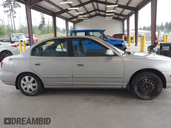 2002 Hyundai Elantra GLS z VIN KMHDN45D52U340239, wystawiony jako IAAI lot #42260604 z przebiegiem 288 297 mil mil oraz . Historia ofert i sprzedaży dostępna na DreamBid. Obrazek 14.