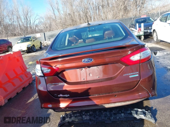 2016 Ford Fusion Titanium with VIN 3FA6P0K90GR244717, listed as a IAAI auction lot 41395806 with 151,853 mi miles. Bid and sale history available at carsss.com. Image 16.