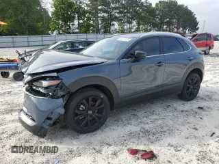 2024 Mazda CX-30 S Carbon Edition z VIN 3MVDMBCMXRM604194, wystawiony jako Copart lot #54777125 z przebiegiem 9 816 mil mil oraz Szkoda całkowita • Salvage title. Historia ofert i sprzedaży dostępna na DreamBid. Obrazek 1.