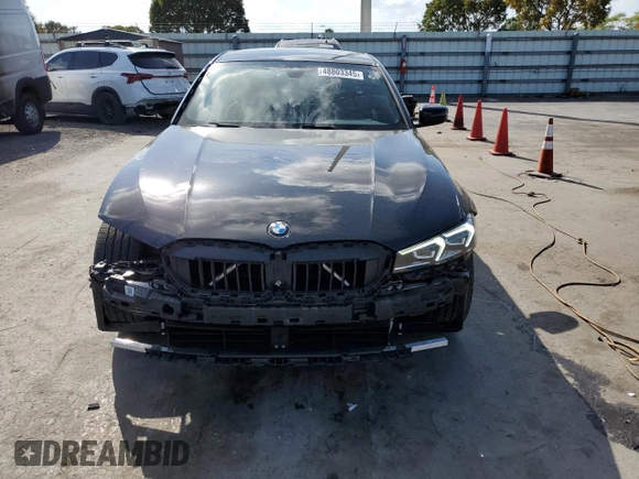 2023 BMW 3 Series 330i with VIN 3MW69FF05P8D21152, listed as a Copart auction lot 48803345 with 21,146 mi miles and Salvage title. Bid and sale history available at DreamBid. Image 5.