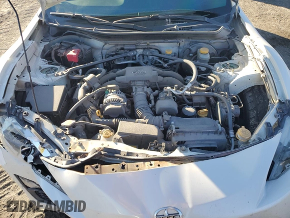 2013 Scion FR-S z VIN JF1ZNAA1XD1731496, wystawiony jako Copart lot #88248615 z przebiegiem 150 921 mil mil oraz Szkoda całkowita • Salvage title. Historia ofert i sprzedaży dostępna na DreamBid. Obrazek 13.