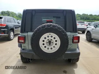 2023 Jeep Wrangler Sport with VIN 1C4HJXDN0PW643485, listed as a Copart auction lot 59783564 with 14,001 mi miles and Salvage Title. Bid and sale history available at DreamBid. Image 6.