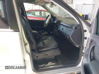 2002 Mercedes-Benz M-Class with VIN 4JGAB54E32A360356, listed as a IAAI auction lot 40540769 with 235,810 mi miles. Bid and sale history available at carsss.com. Image 5.