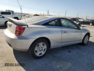 2003 Toyota Celica GT with VIN JTDDR32T130164099, listed as a Copart auction lot 77907374 with 73,950 mi miles and Salvage Title. Bid and sale history available at carsss.com. Image 3.