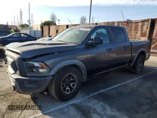 2016 Ram 1500 Rebel z VIN 1C6RR7YT6GS211830, wystawiony jako Copart lot #54072485 z przebiegiem 56 512 mil mil oraz Szkody całkowita. Historia ofert i sprzedaży dostępna na DreamBid. Obrazek 1.