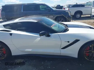 2014 Chevrolet Corvette Z51 3LT z VIN 1G1YM2D71E5116935, wystawiony jako IAAI lot #42341161 z przebiegiem 105 686 mil mil oraz . Historia ofert i sprzedaży dostępna na DreamBid. Obrazek 13.