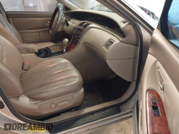 2004 Toyota Avalon XL z VIN 4T1BF28B34U366361, wystawiony jako IAAI lot #42219572 z przebiegiem 231 782 mil mil oraz . Historia ofert i sprzedaży dostępna na DreamBid. Obrazek 5.