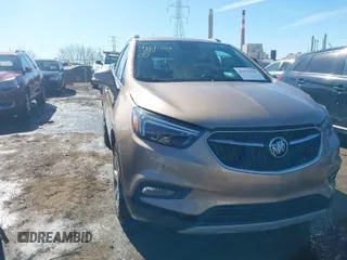 2019 Buick Encore Essence with VIN KL4CJGSM8KB861415, listed as a IAAI auction lot 41675619 with 51,555 mi miles. Bid and sale history available at carsss.com. Image 1.