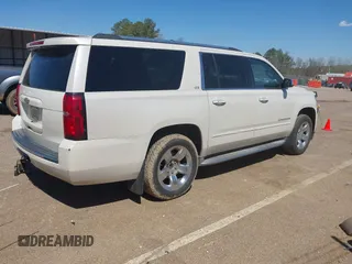 2015 Chevrolet Suburban LTZ with VIN 1GNSCKKC3FR113388, listed as a IAAI auction lot 41867964 with 238,530 mi miles and . Bid and sale history available at DreamBid. Image 4.