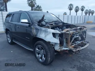 2015 Chevrolet Tahoe LTZ z VIN 1GNSKCKC5FR213209, wystawiony jako IAAI lot #41023368 z przebiegiem Nie podano mil oraz . Historia ofert i sprzedaży dostępna na DreamBid. Obrazek 1.